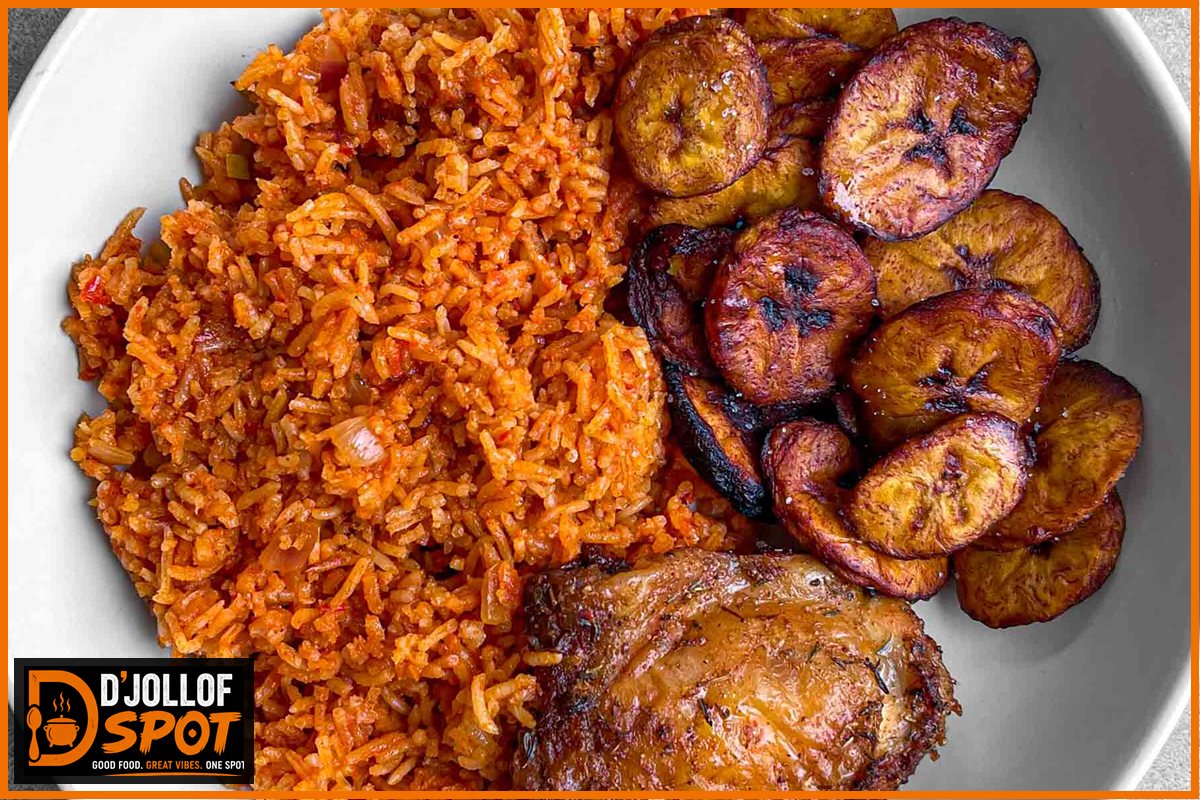 A D'Jollof Spot bowl of smoky jollof rice with grilled chicken and sweet fried plantains